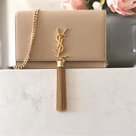 ysl gold tassel clutch|ysl kate clutch sale.